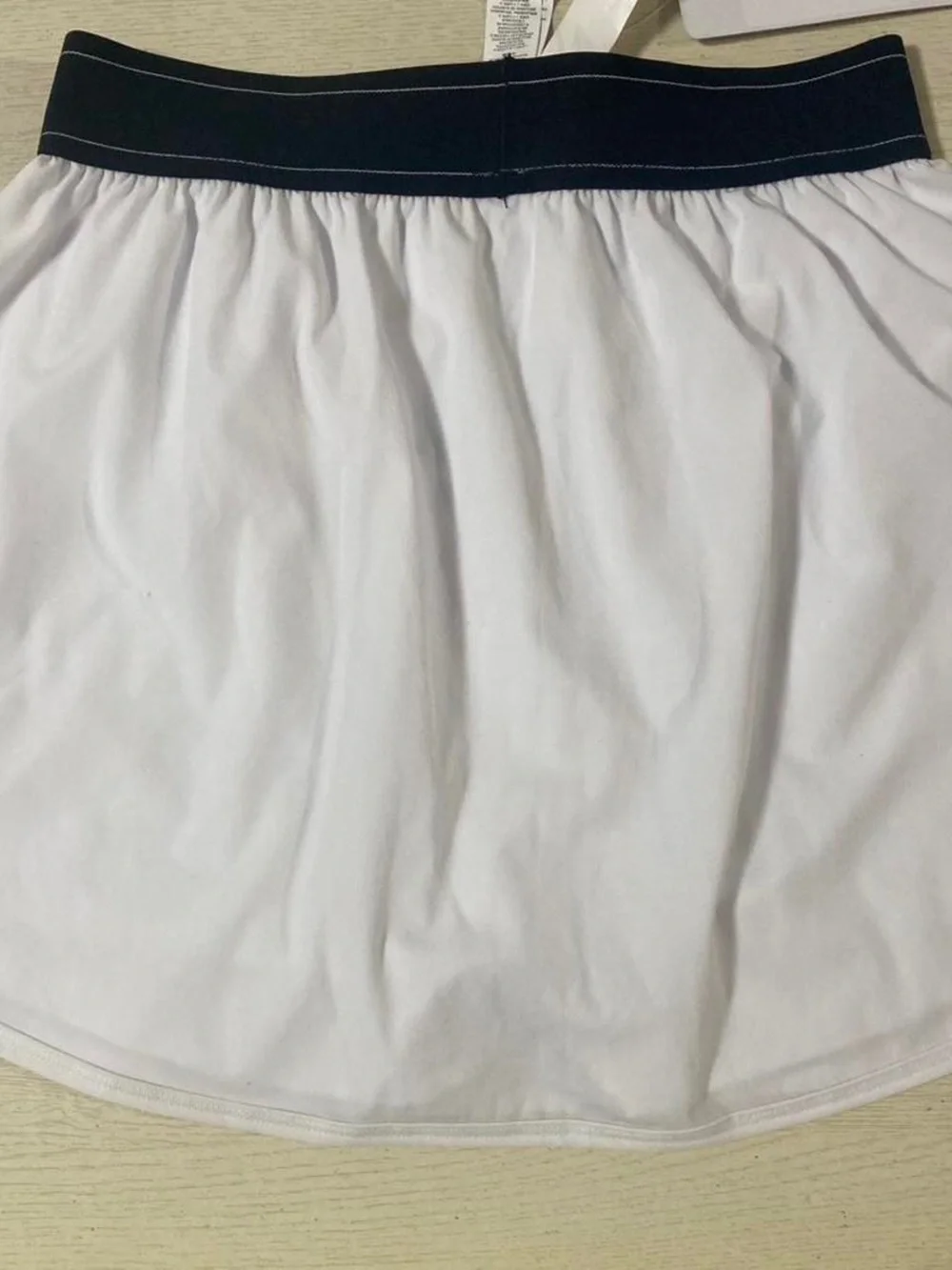 ALO Yoga White Circle Skater Skirt with Black Elastic Waistband